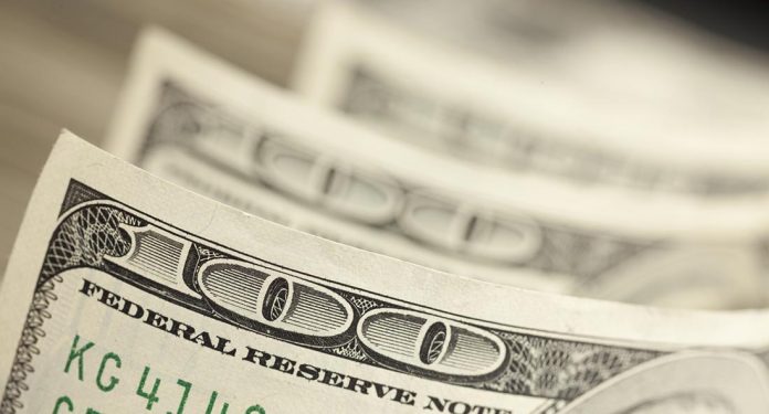 An Abstract of One Hundred Dollar Bills with Narrow Depth of Field.