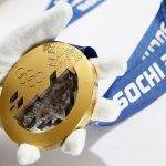 A gold medal manufactured for the 2014 Winter Olympic Games in Sochi, is seen on display at the Adamas jewellery factory in Moscow
