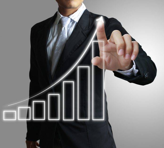 Businessman hand showing graph