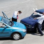 Traffic accident and to drivers fighting