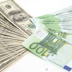 Many Euro and Dollars on white background