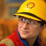 shell-employee-in-red-uniform-and-yellow-hard-hat