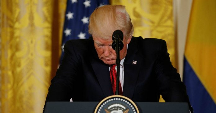 trump-mic-looking-down