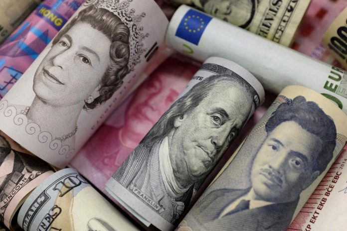Bank notes of Euro, Hong Kong dollar, U.S. dollar, Japanese yen, GB pound and Chinese yuan are seen in this picture illustration