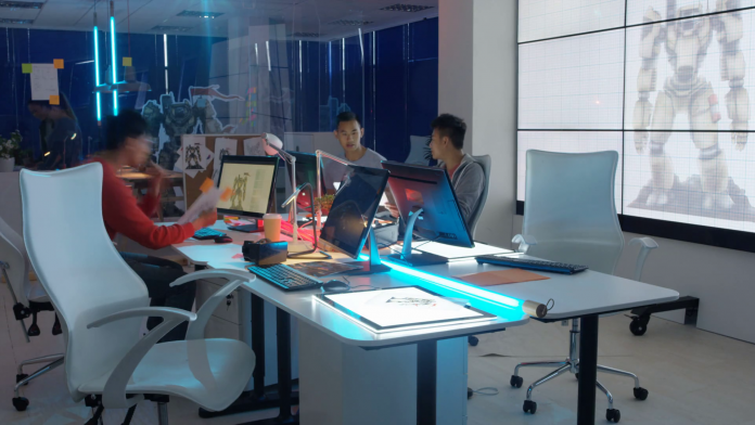 4k-time-lapse-young-asian-video-game-designers-collaborating-on-a-project_smnliqktl_thumbnail-full01