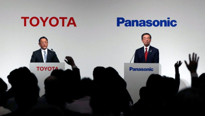 Toyota Motor Corp President Toyoda and Panasonic Corp President Tsuga attend a joint news conference in Tokyo