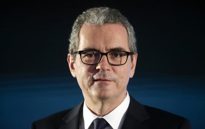 Inditex's Chairman and CEO Isla attends a news conference at the headquarters of Inditex group in Arteixo