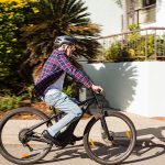 Senior man riding ebike