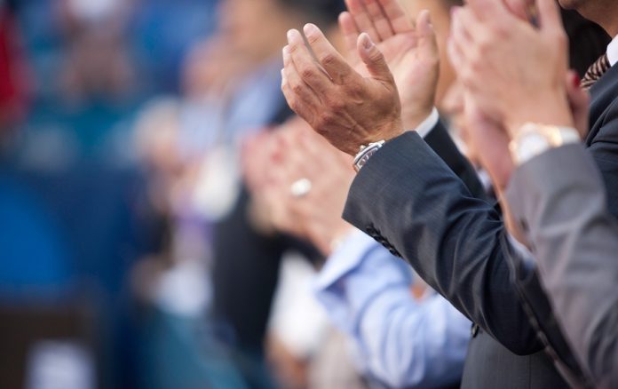 Applauding